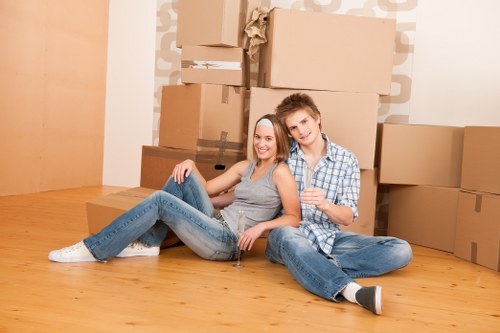Packing boxes and furniture into a mobile storage unit in Millwall