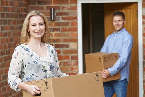 Staff following safe storage procedures in a warehouse environment