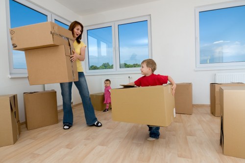 Unloading boxes into a new flat during a Millwall removal